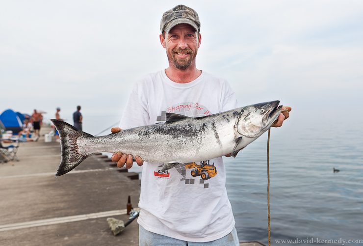 f RacinJames Peterson poses with his 12-pound Chinook Salmon