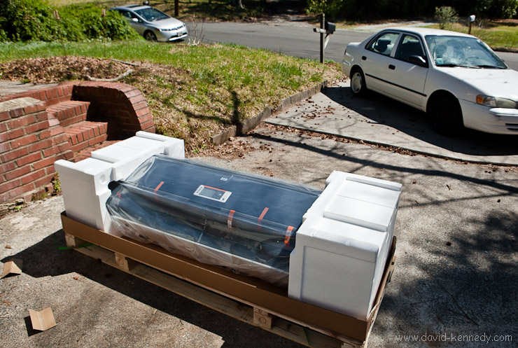 Unpacking the printer in the driveway